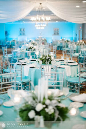 Embassy Suites Altamonte Springs Wedding with Tiffany blue Teal Uplighting by Our DJ Rocks www.ourdjrocks.com. #ourdjrocks Photo by Gian Carlo Photography