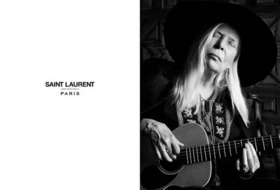 多年后，宝刀未老的Joni Mitchell依旧以一身嬉皮民谣风格造型出现在Saint Laurent 2015春夏广告中