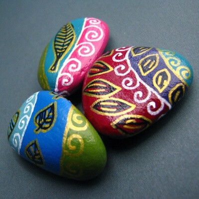 MANY ways to paint rocks ...using many colors, single colors, &amp;amp; even melting crayons on warm rocks while drawing ...geometric patterns (simple to complex) + images (simple to more realistic) . . .plus a few rub-on transfers + 1 glass