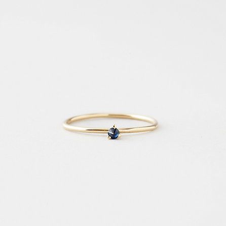 Tiny sapphire ring.