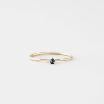 Tiny sapphire ring.