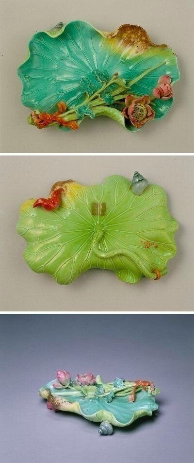 清乾隆--粉彩--雕镶荷叶香橼 清宫旧藏。 所谓“香橼盘”指古人书斋中陈设的一种小型果盘，其常置黄色香橼或佛手于其中，可散发出宜人的香气，平添不少雅趣。 此器造型、釉色均刻意摹仿自然界中的实物，色彩与质感都…