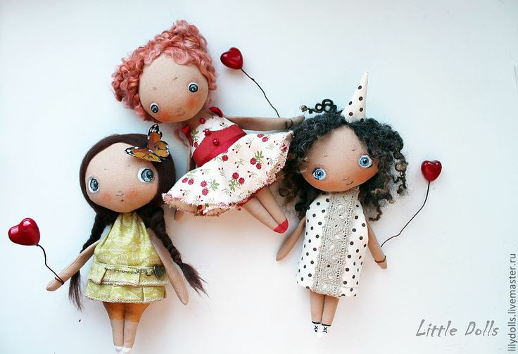 a cute trio of dolls...: