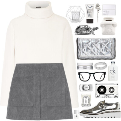 A fashion look from December 2015 featuring turtle neck tops, wet look skirt and metallic shoes. Browse and shop related looks.