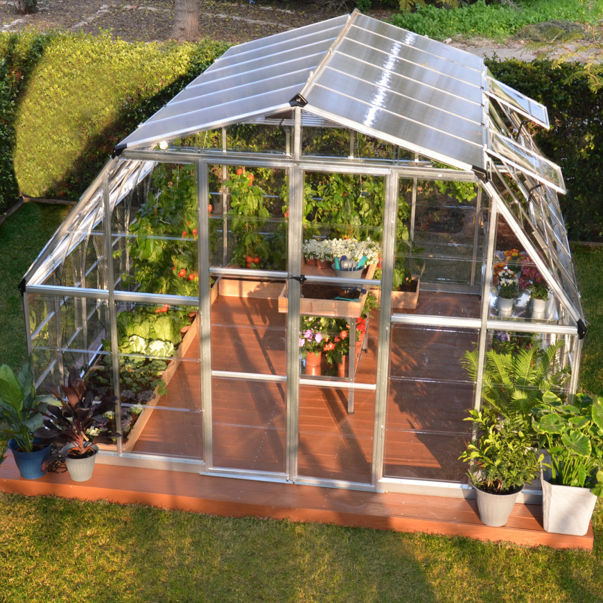 Here is a nice and spacious greenhouse from a kit. The dome design allows for hanging plants, planter plants, and a few shelves for potted plants. You can have a variety of plants in this setup.