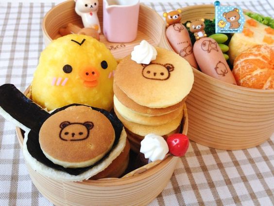 Kiiroitori Pancake Bento A cheery pancake bento to start the day! Kiiroitori is the yellow chick character from the popular Rilakkuma San-X series. But the highlight for me was the mini pancakes that I made! Aren’t they cute? http://en.bentoandco.com/blogs/news/10588045-kiiroitori-pancake-bento: