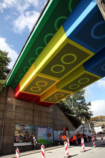 Street Artist Megx Creates Giant Lego Bridge in Germany: