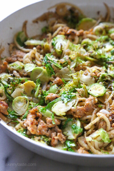 Spiralized parsnips make a wonderful pasta replacement in this spicy Autumn dish made with brussels sprouts and spicy chicken sausage.