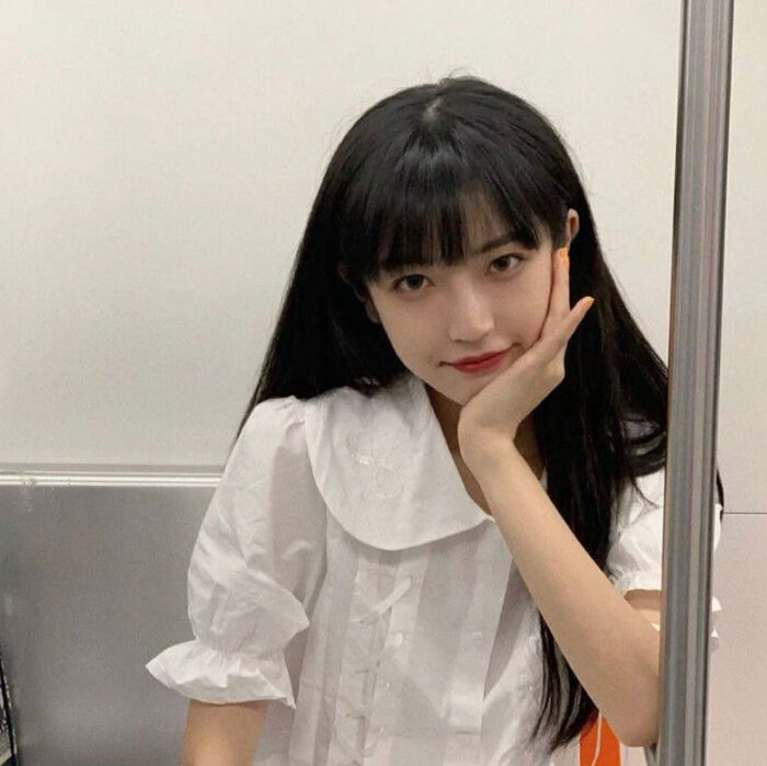 I hide my rose behind me, hoping to keep my date with you.