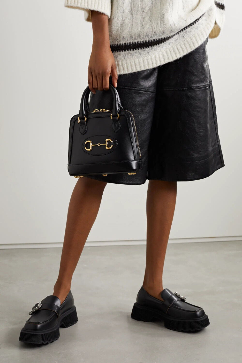 gucci 这款 "1995" 手提包出自 "epilogue"(终曲)系列,是对诞生于