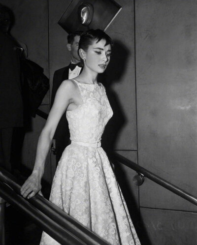 Audrey Hepburn on stage accepting her Oscar for Best Actress in a Leading Role for her performance in Roman Holiday in New York, March 25th, 1954 ​​​