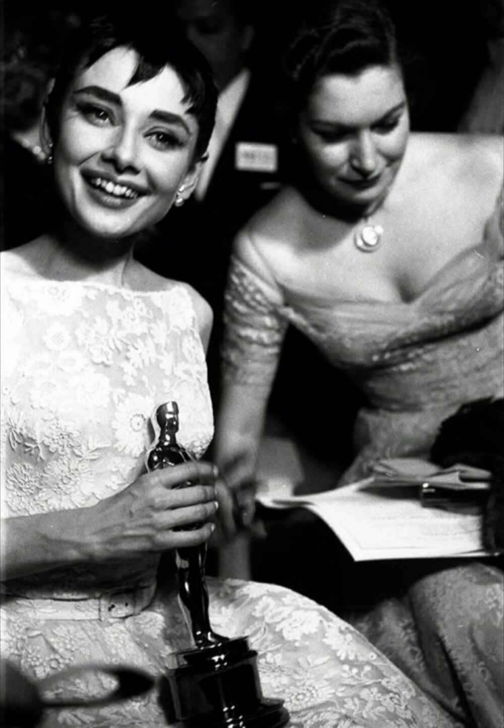 Audrey Hepburn on stage accepting her Oscar for Best Actress in a Leading Role for her performance in Roman Holiday in New York, March 25th, 1954 ​​​