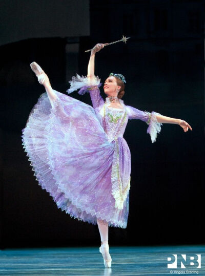 PNB soloist Kylee Kitchens dancing the role Fairy Godmother in a lavender tulle skirt designed by Martin Pakledinaz for Kent Stowell's Cinderella