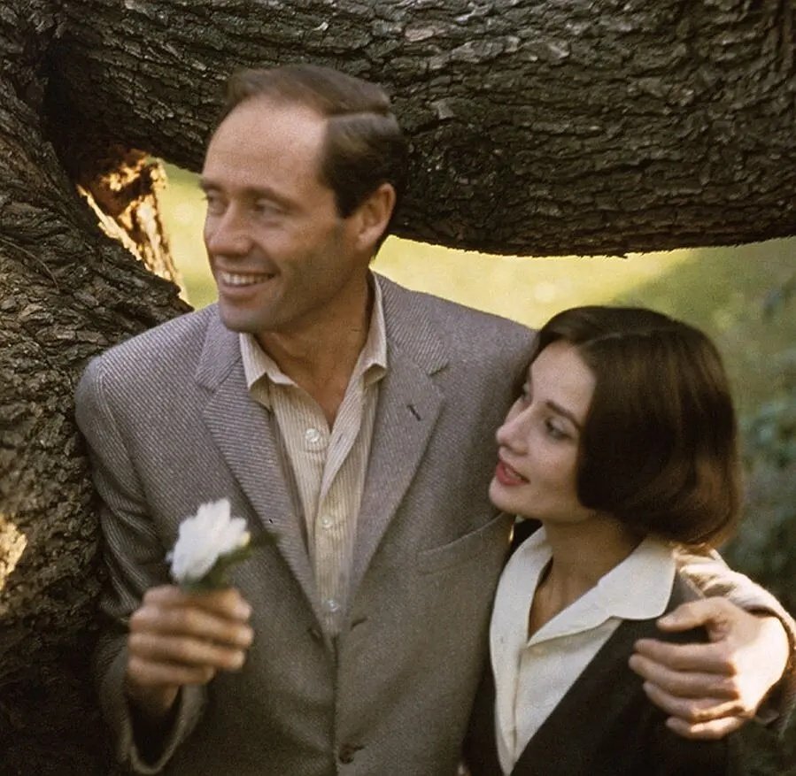 Audrey Hepburn and Mel Ferrer with their pet dog, Famous, outside their home in Los Angeles, CA,1957. ​​​