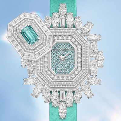 Harry Winston Ultimate Emerald Signature 高级珠宝腕表 白金表壳，尺寸32×46mm，厚度11.8mm，主石为一颗0.80ct的祖母绿型切割帕拉伊巴碧玺，点缀榄尖形、长阶梯形和圆形切割钻石，表盘镶嵌圆形切割帕拉伊巴碧玺，…