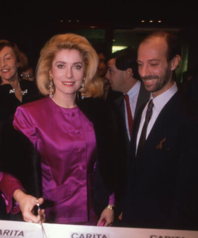 Catherine Deneuve at the inauguration of a Carita show in Paris on December 6, 1988, France.
