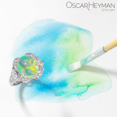 Oscar Heyman 白金戒指 火欧泊 钻石 The incredible colors of this Mexican fire opal were captured using natural sunlight