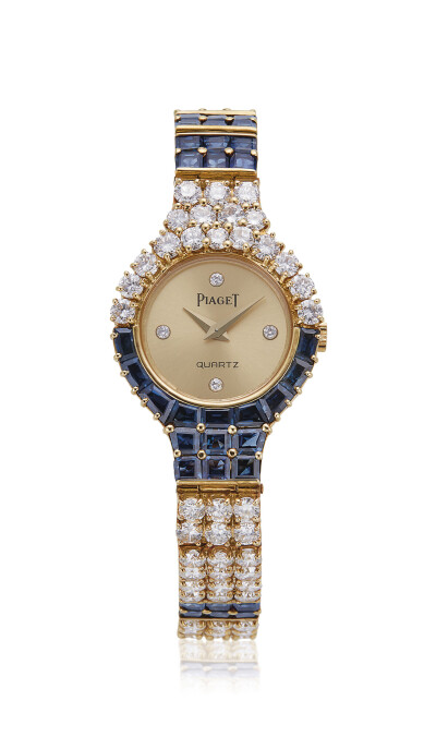 Piaget 伯爵 彩色珠宝腕表，镶嵌圆形切割钻石，小切角校准切割蓝宝石，18K金（750），石英机芯，16厘米，附加链节1.5厘米，总重42.48克。成交价1.25万欧元