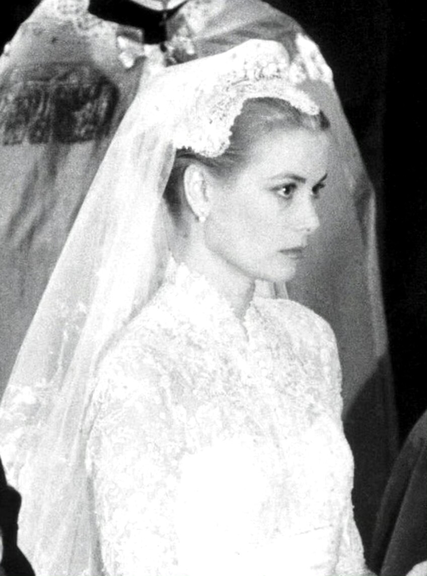 Grace Kelly at Monaco Cathedral for her wedding to Prince Rainier III of Monaco 1956. ​​