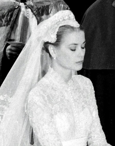 Grace Kelly at Monaco Cathedral for her wedding to Prince Rainier III of Monaco 1956. ​​