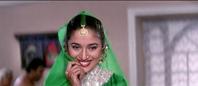 玛杜丽·迪克西特（Madhuri Dixit）在《情到浓时》里饰演的妮莎