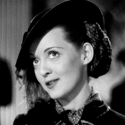 1938年电影《红衫泪痕》里的贝蒂·戴维斯 ​​​