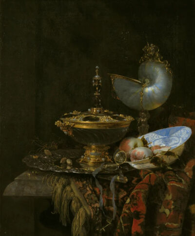 Willem Kalf：有荷尔拜因碗、鹦鹉螺杯、玻璃高脚杯和水果盘的静物
1678年，丹麦哥本哈根艺术博物馆
