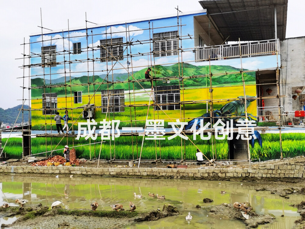 好呀～我帮你写一个既有画面感又能体现“现代新农业”的美丽乡村墙绘文案，你可以直接用作宣传或上墙标语。
 
美丽乡村·绘出振兴新画卷
田野间，稻浪翻涌，不是旧时光的复刻，而是科技与土地的握手。
无人机掠过金色的天际，智能温室孕育四季的生机，
生态循环的清泉，灌溉着希望的田野。
我们用画笔，把现代新农业的脉动，绘进村庄的每一面墙，
让每一道色彩，都是丰收的注脚，
让每一笔线条，都是乡村振兴的方向。
来吧，走进这幅画里，
看见——传统与现代交织，
呼吸——泥土与科技的芬芳。
美丽乡村，从这一面墙开始，向未来生长。