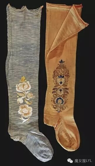 Two pairs of stockings, c. 1750. Silk stockings with floral silk embroidery.