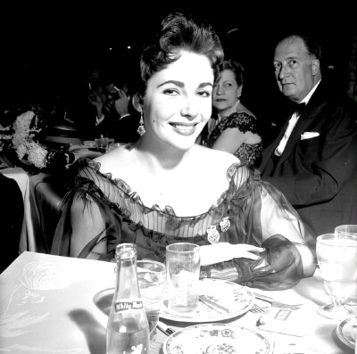 Elizabeth Taylor attending the premiere of “Hit the Deck” at the Cocoanut Grove, c. 1955 ​​​
