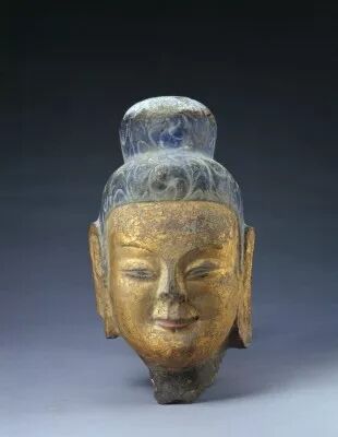 北魏  贴金佛像头北京故宫博物院藏