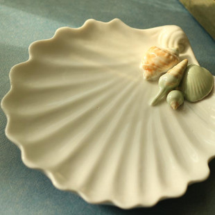 这个盘子太棒了~！有海滩的感觉~<br /><a class='shortlnk' href='/s/1341e360' target='_blank' title='http://item.taobao.com/item.htm?id=9307548887'>http://duitang.com/s/1341e360</a>