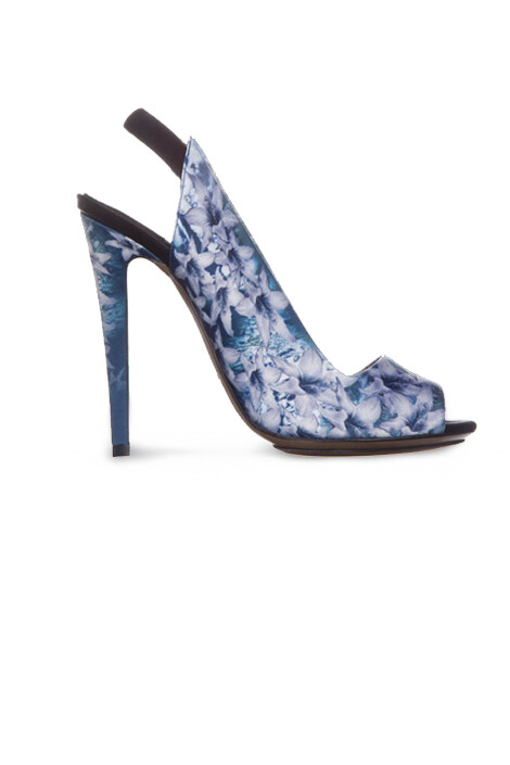 One way to pay apt tribute to the launch of summer is this pair of Nicolas Kirkwood slingbacks. Sleek and stunning in both palette and print