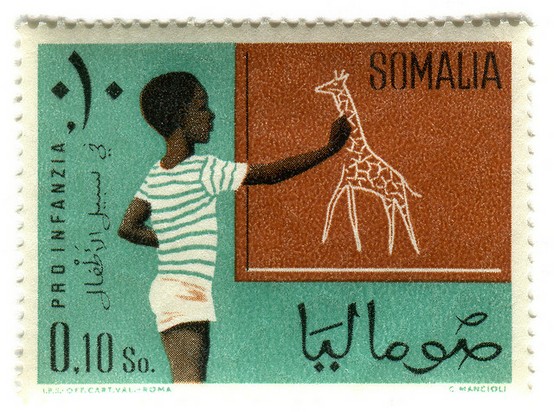 这个是非洲哪个国家的邮票，小男孩在画长颈鹿