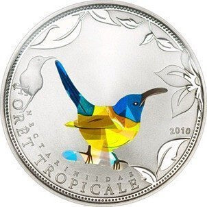 棱柱太阳鸟。多哥（非洲西部） 的这枚硬币，在纯银的背景中刻着一只棱柱体的太阳鸟，当移动硬币时，硬币随着光线变化而闪烁，并改变颜色。