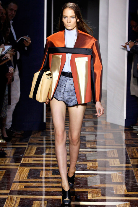 Balenciaga Spring/Summer 2012Paris Fashion WeekBig volumes, solid forms and shiny fabrics in a beautiful, architectural collection.