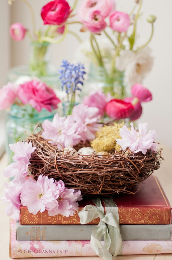 Breathtaking nest,books and flowers.