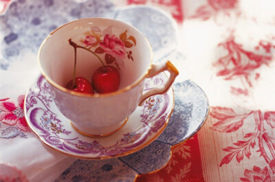 From debitreloar.com-Pink cup and saucer cherry toile fabric.