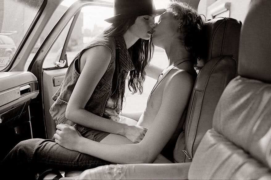 Kiss in a car.