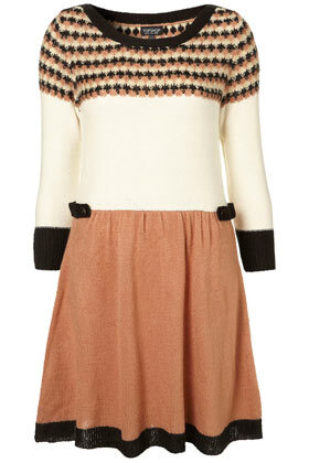 Knitted patterned dress in cream with tab details and contrast skater skirt and sleeves. 80% Acrylic,20% Cotton