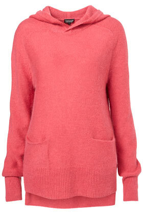 Knitted pink hoody in a slouchy style with all-over fluffy stitch. 71% Acrylic,16% Nylon,13% Angora.