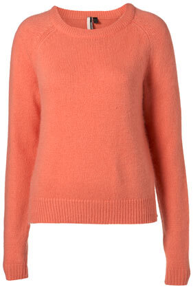 Knitted fluffy jumper with side split detail in peach. 58% Nylon,37% Angora,5% Wool.