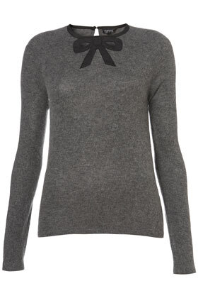 Knitted long sleeve top in charcoal with black bow detail on the neckline. 71% Acrylic,16% Nylon,13% Angora.