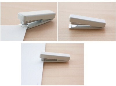 《订书机》可以使钉子钉在90°书角正中间，还可以使定子和直线边缘平行。