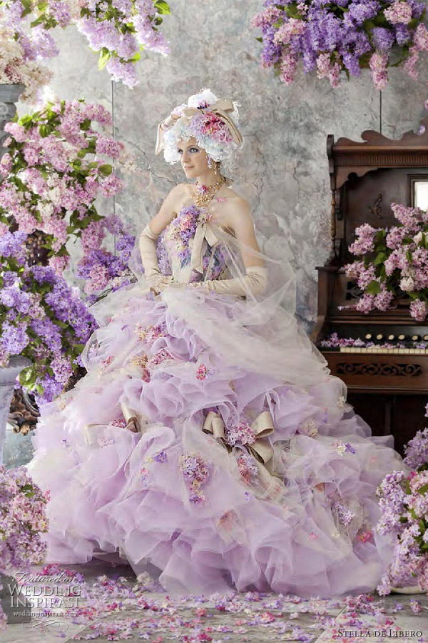 Pale pink ball gown with pleated accent at waist. White and multi colored version featured here.