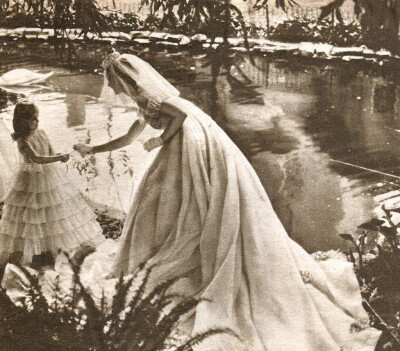 Nina RicciModel Julie Christine poses with a Wedding Dress of the Maison Nina Ricci.Vogue French,May 1964.