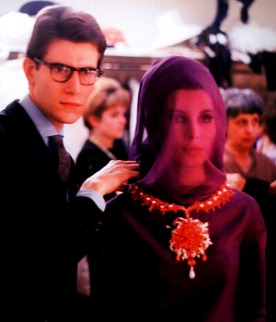 Yves Saint Laurent and VictoireFashion designer Yves Saint Laurent with his 1960's model Victoire in backstage during his First Haute Couture Show.Paris,1962.
