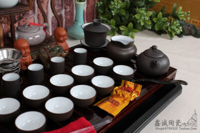 http://s.click.taobao.com/t_8?e=7HZ6jHSTZPxyqowYYbCm1fRMNU%2FtaMhcVlHXNjndTEDy&p=mm_28126595_0_0宜兴紫砂茶具套装功夫茶具实木茶盘