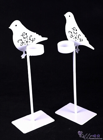 这是一个烛台哦...看不出来吧，小鸟造型特别有爱...