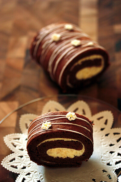 cocoa roll cake with flowers